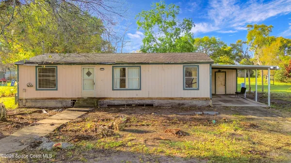 a bathroom with a sink and a window