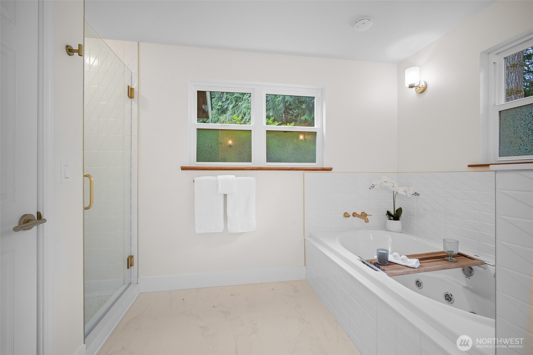 5656 Doran Road Acme, WA 98220 - Photo 17 of 39 a bathroom with a bathtub and a window