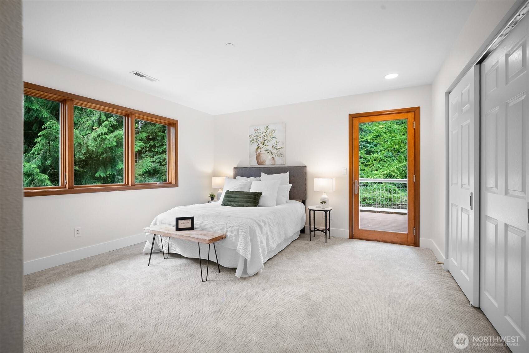 5656 Doran Road Acme, WA 98220 - Photo 24 of 39 a spacious bedroom with a bed and a window