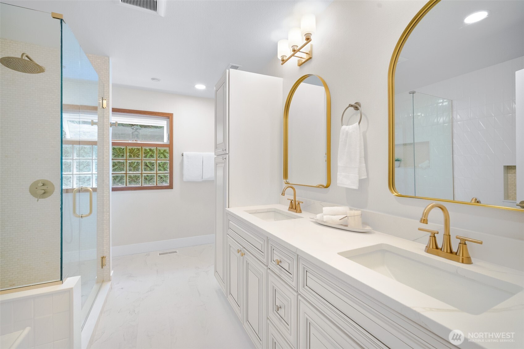 5656 Doran Road Acme, WA 98220 - Photo 29 of 39 a spacious bathroom with a double vanity sink a mirror and a shower