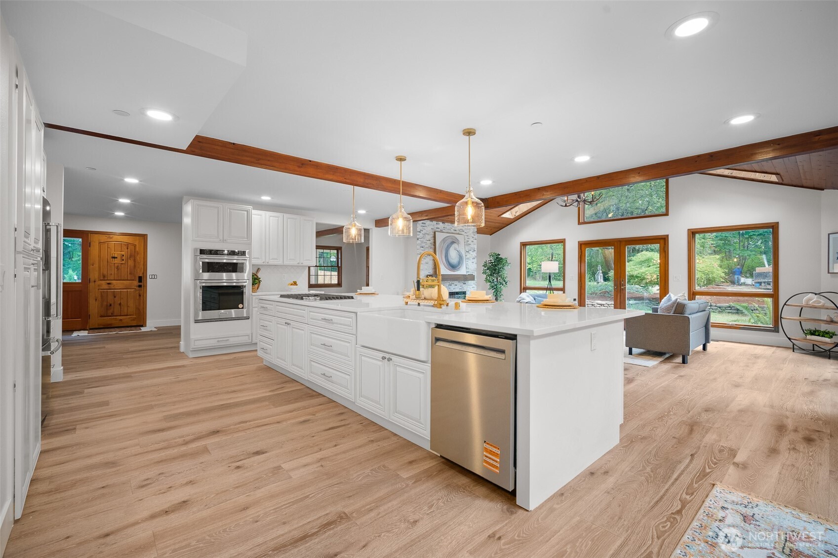 5656 Doran Road Acme, WA 98220 - Photo 3 of 39 a large white kitchen with a large counter top appliances and cabinets