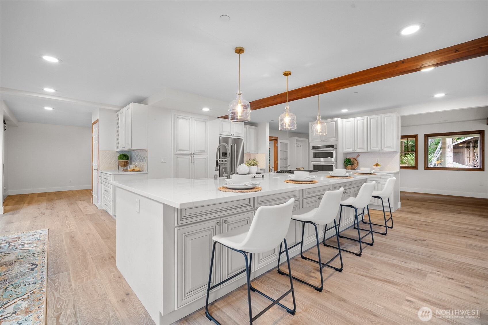 5656 Doran Road Acme, WA 98220 - Photo 6 of 39 a large kitchen with a table and chairs