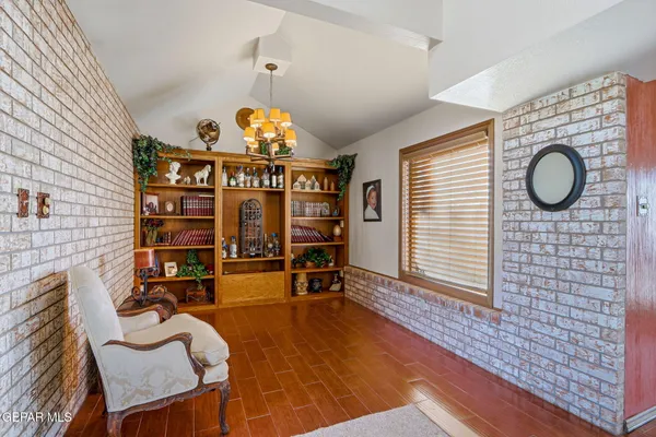a kitchen with sink stove and refrigerator
