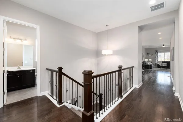 a view of a hallway view with staircase