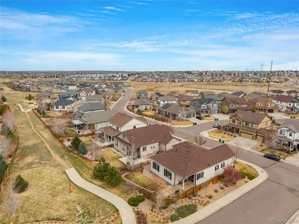 an aerial view of residential building with parking space