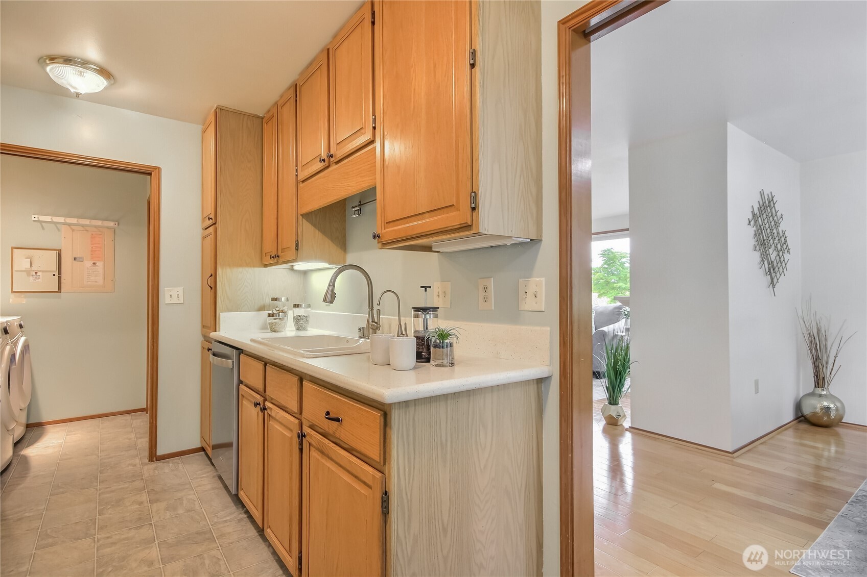4106 221st Place Southeast, Unit 1072 Issaquah, WA 98029 - Photo 15 of 40 a kitchen with a sink cabinets and a window