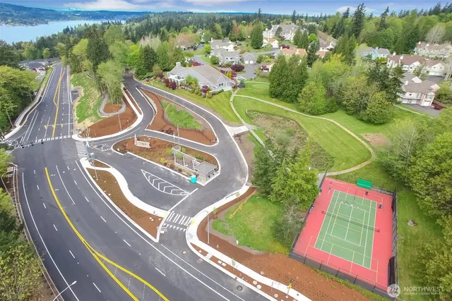 a view of a swimming pool with a yard