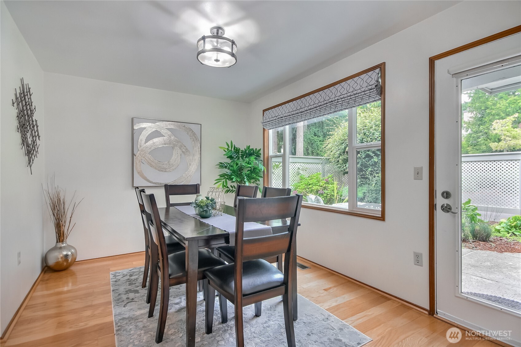 4106 221st Place Southeast, Unit 1072 Issaquah, WA 98029 - Photo 10 of 40 a view of a dining room with furniture window and outside view