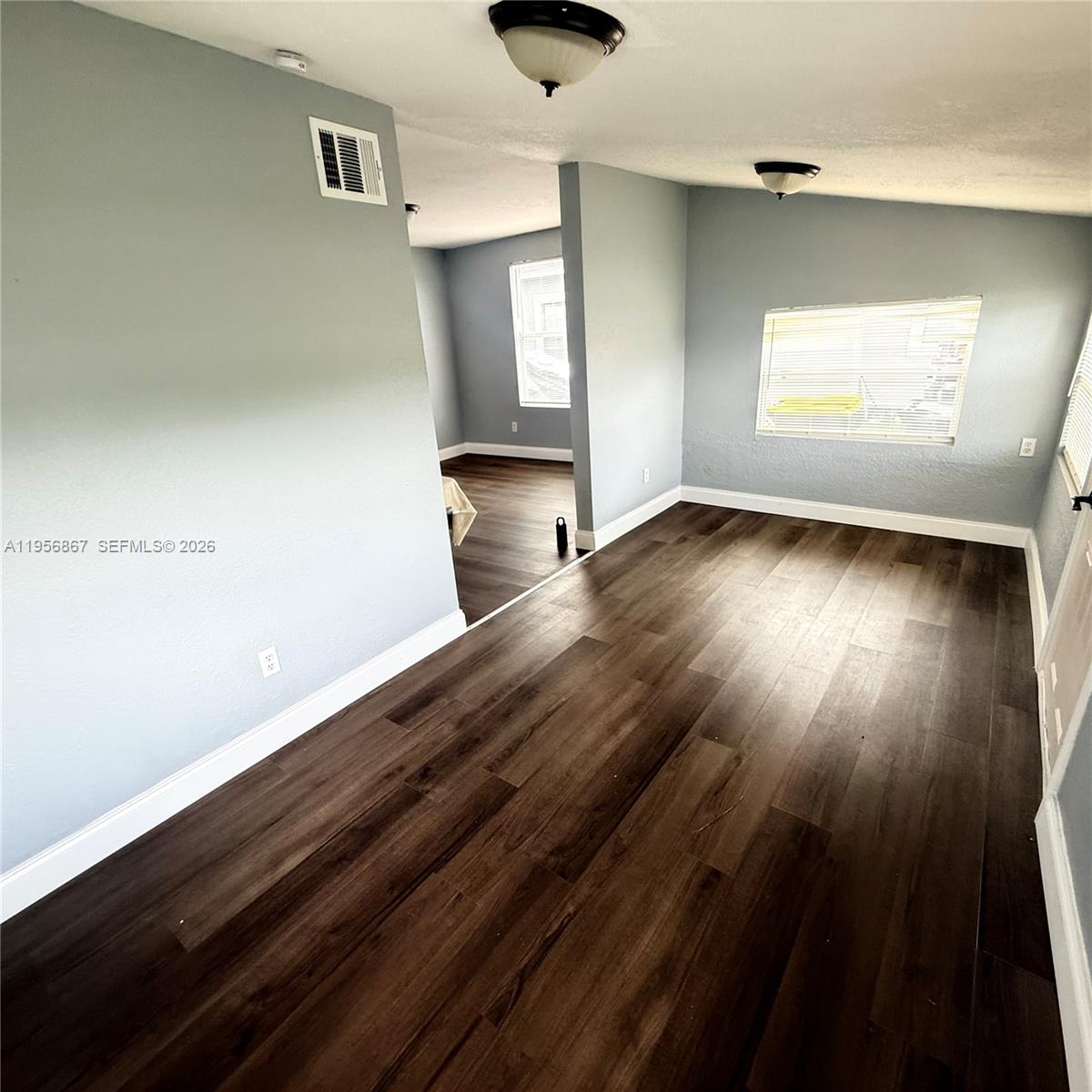 770 Broone Clermont, FL 34711 - Photo 11 of 32 wooden floor in an empty room