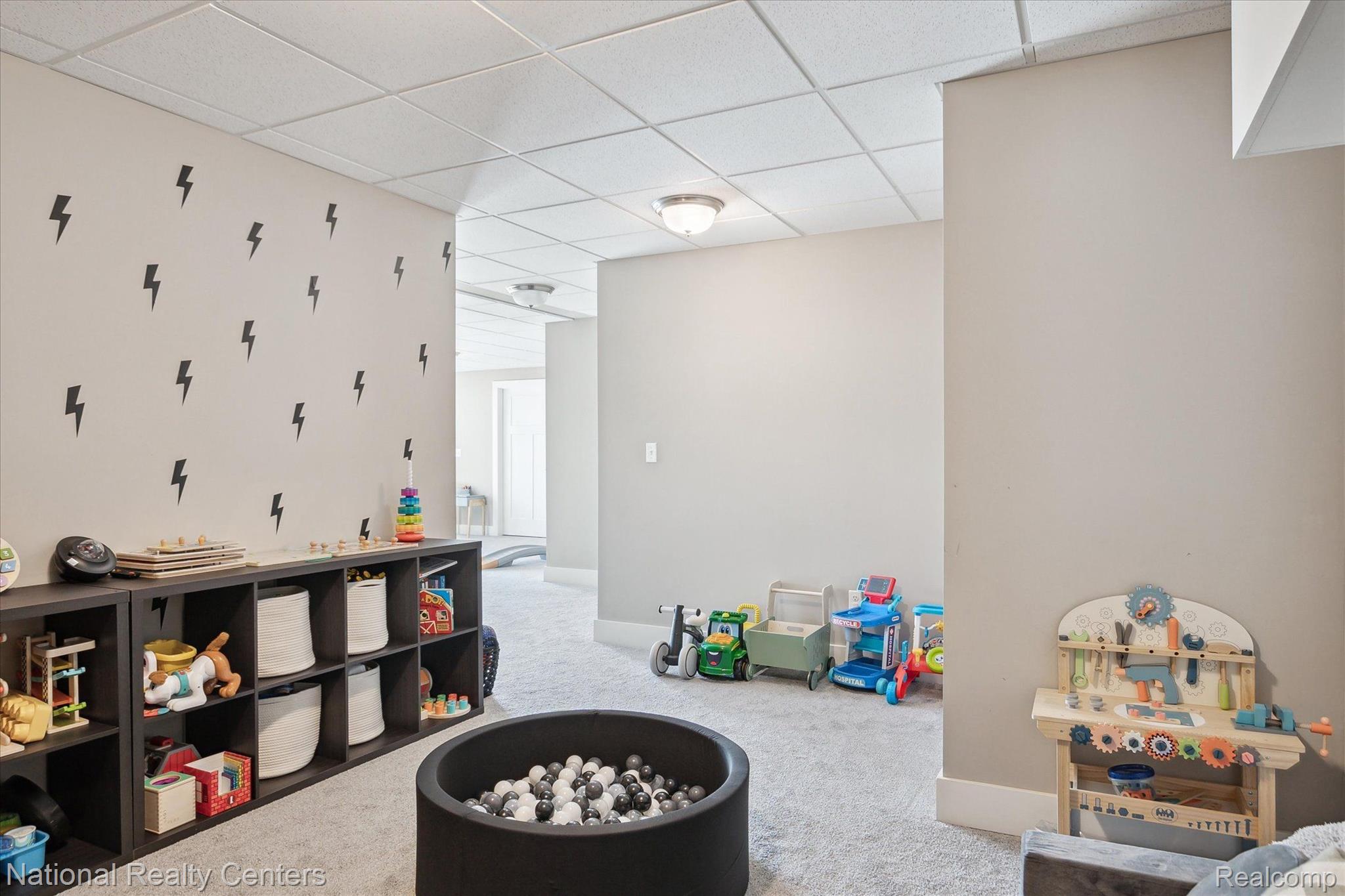 2778 Swarthout Road Pinckney, MI 48169 - Photo 34 of 47 Multiple areas for play spaces in lower level