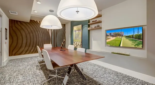 a living room with fireplace furniture and a flat screen tv