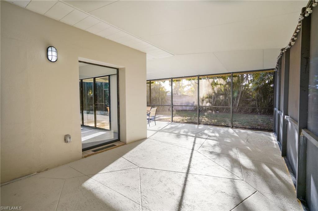 3581 Corana Way Naples, FL 34105 - Photo 17 of 26 a room with a large window