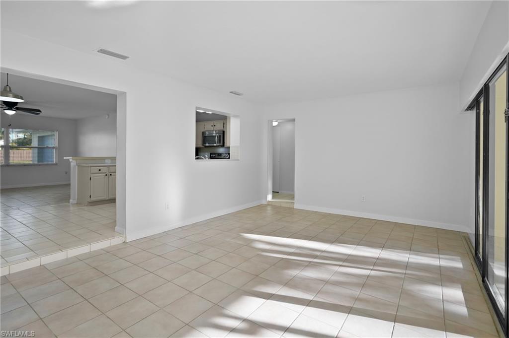 3581 Corana Way Naples, FL 34105 - Photo 7 of 26 a view of livingroom with natural light