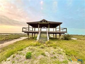 30 Boca Grande Loop Port O'Connor, TX 77982 - Photo 16 of 19 a view of a lake with a table and chairs
