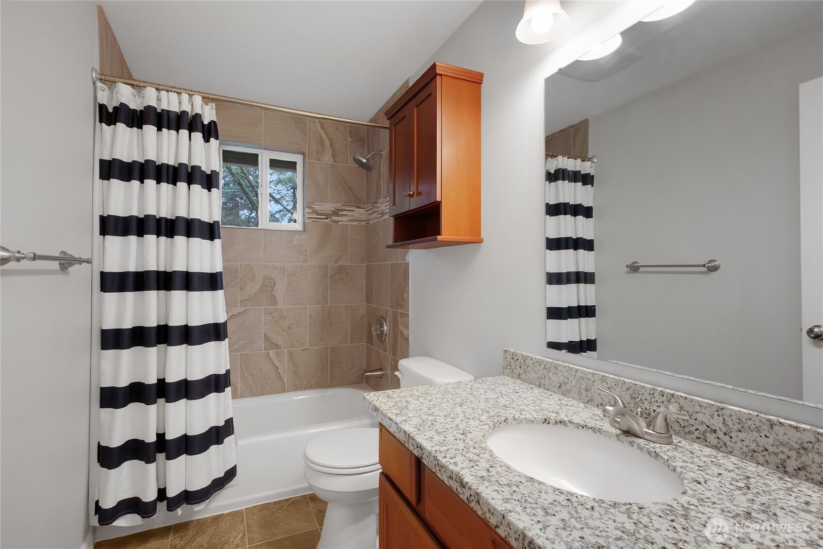 30331 9th Avenue South Federal Way, WA 98003 - Photo 14 of 36 a bathroom with a granite countertop sink a toilet and shower
