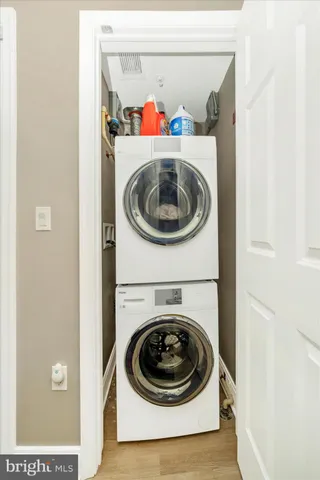 a bathroom with a sink mirror toilet and shower