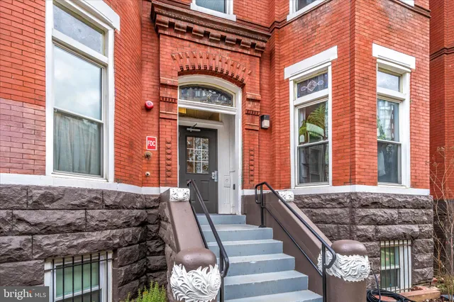 a house view with a wooden table and chair
