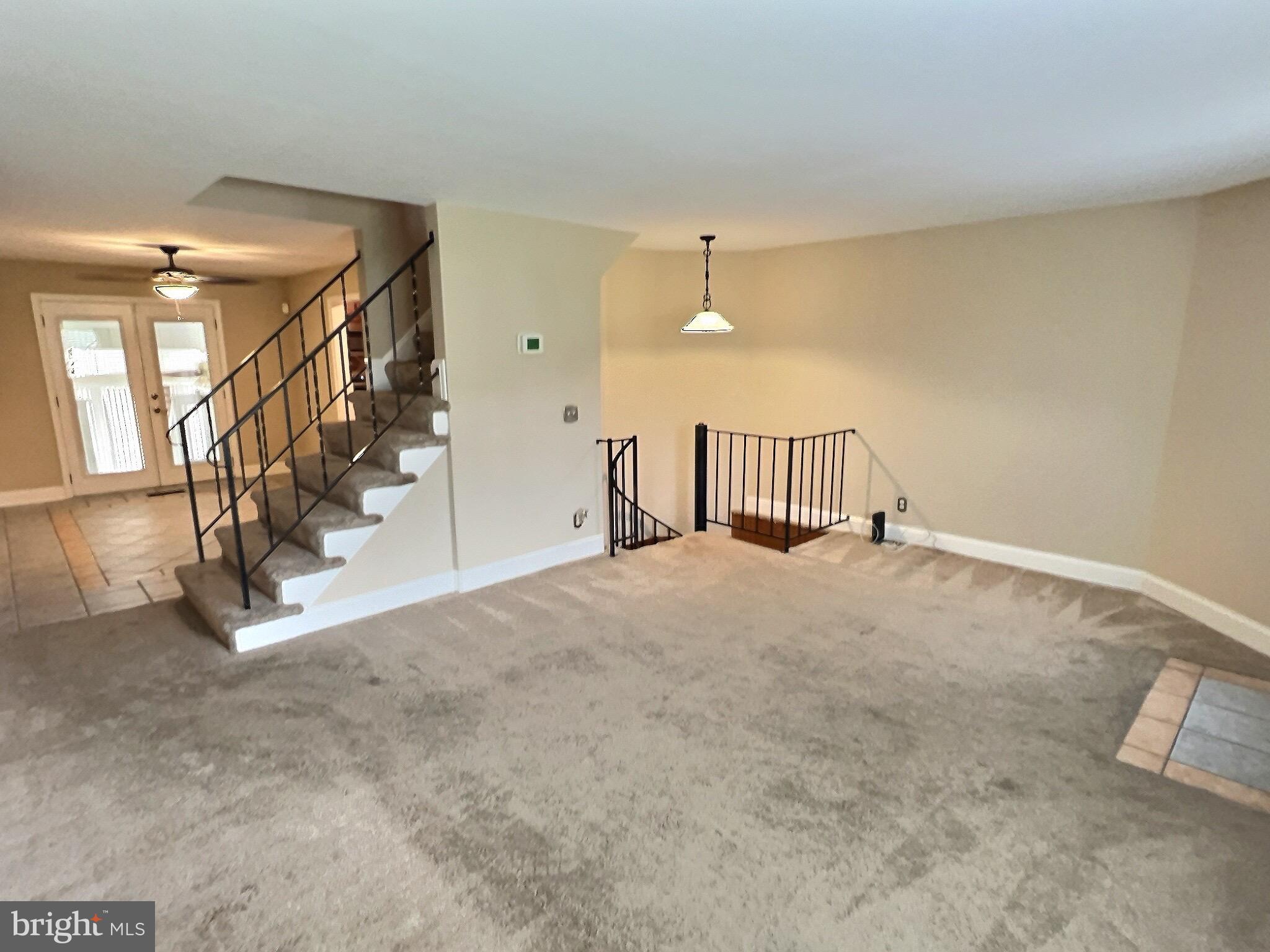 1944 Church Road Baltimore, MD 21222 - Photo 3 of 14 a view of an empty room with stairs