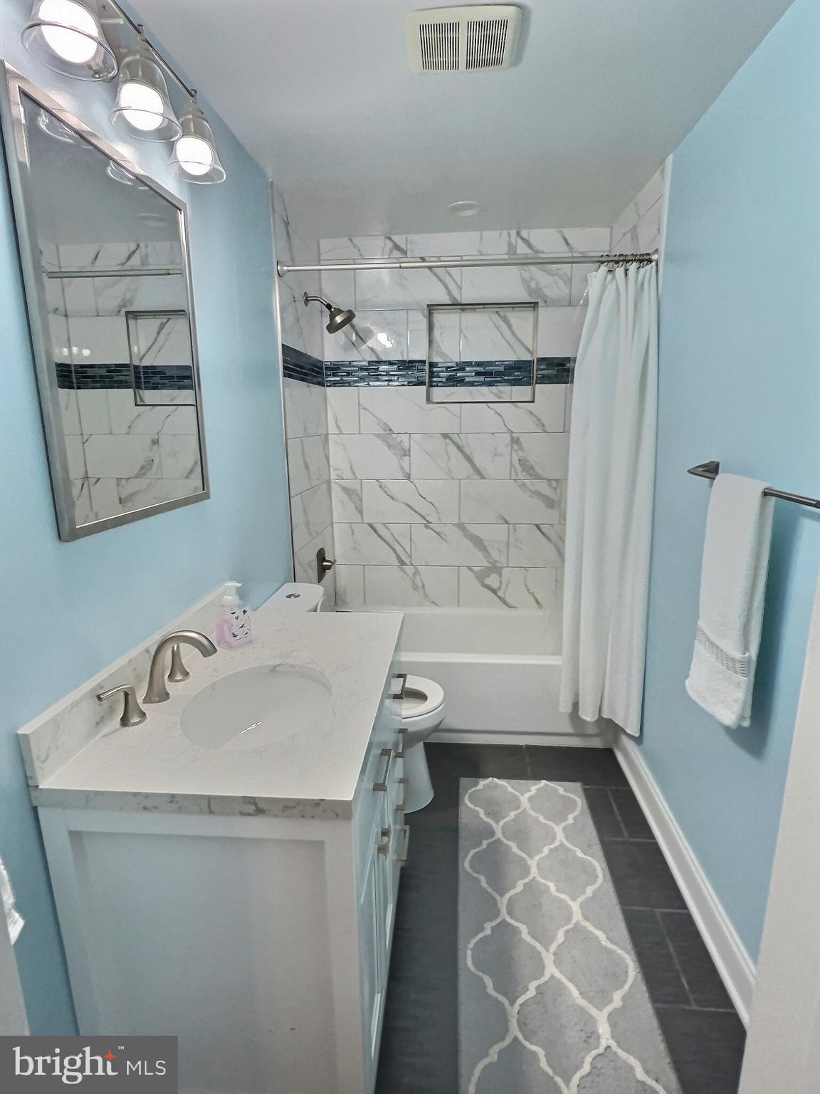 1944 Church Road Baltimore, MD 21222 - Photo 7 of 14 a bathroom with a sink and a mirror
