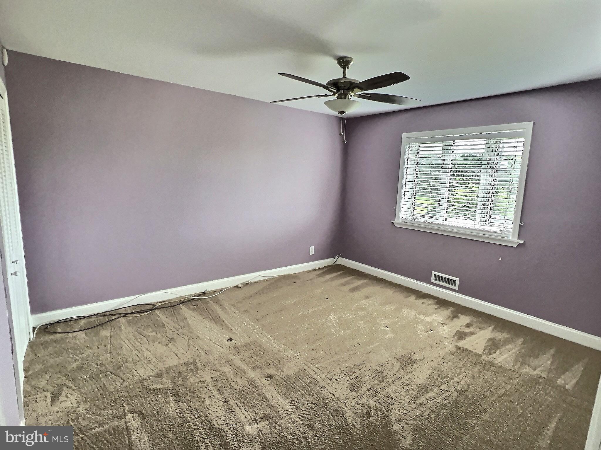 1944 Church Road Baltimore, MD 21222 - Photo 8 of 14 an empty room with a window