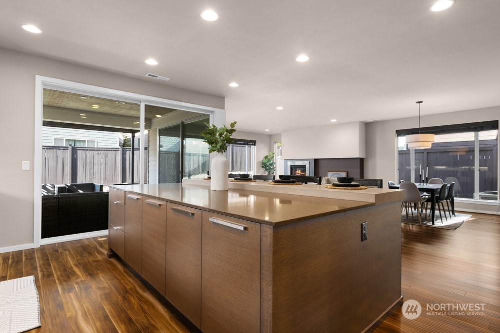 4021 168th Place Southeast Bothell, WA 98012 - Photo 11 of 39 a kitchen with stainless steel appliances granite countertop a sink and cabinets