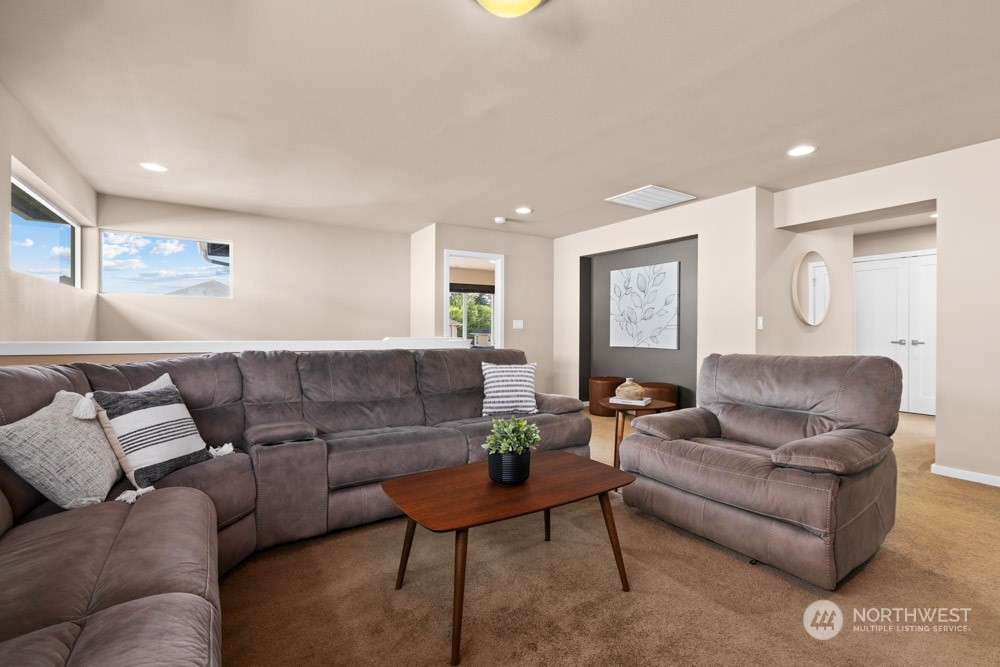 4021 168th Place Southeast Bothell, WA 98012 - Photo 17 of 39 a living room with furniture and a potted plant