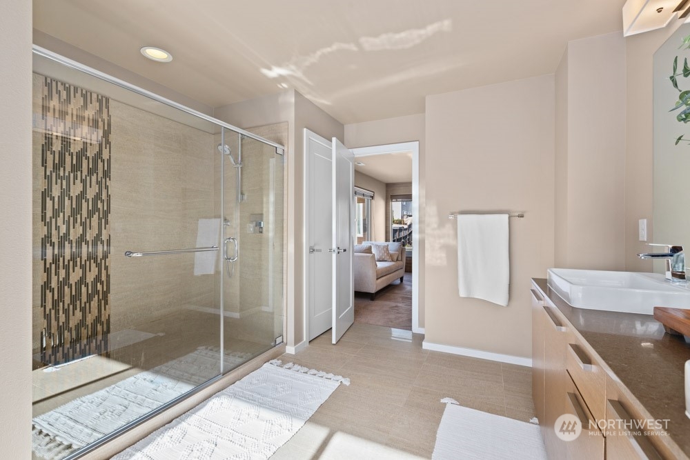 4021 168th Place Southeast Bothell, WA 98012 - Photo 24 of 39 a bathroom with a shower and a sink