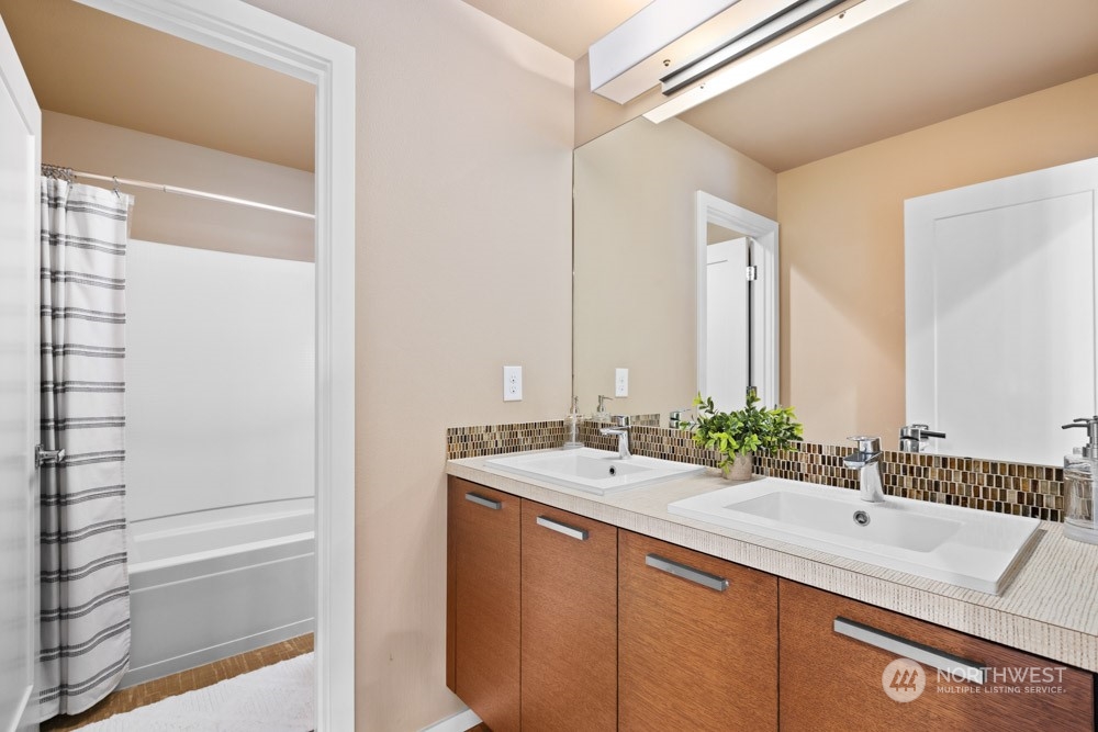 4021 168th Place Southeast Bothell, WA 98012 - Photo 29 of 39 a bathroom with a sink and a mirror