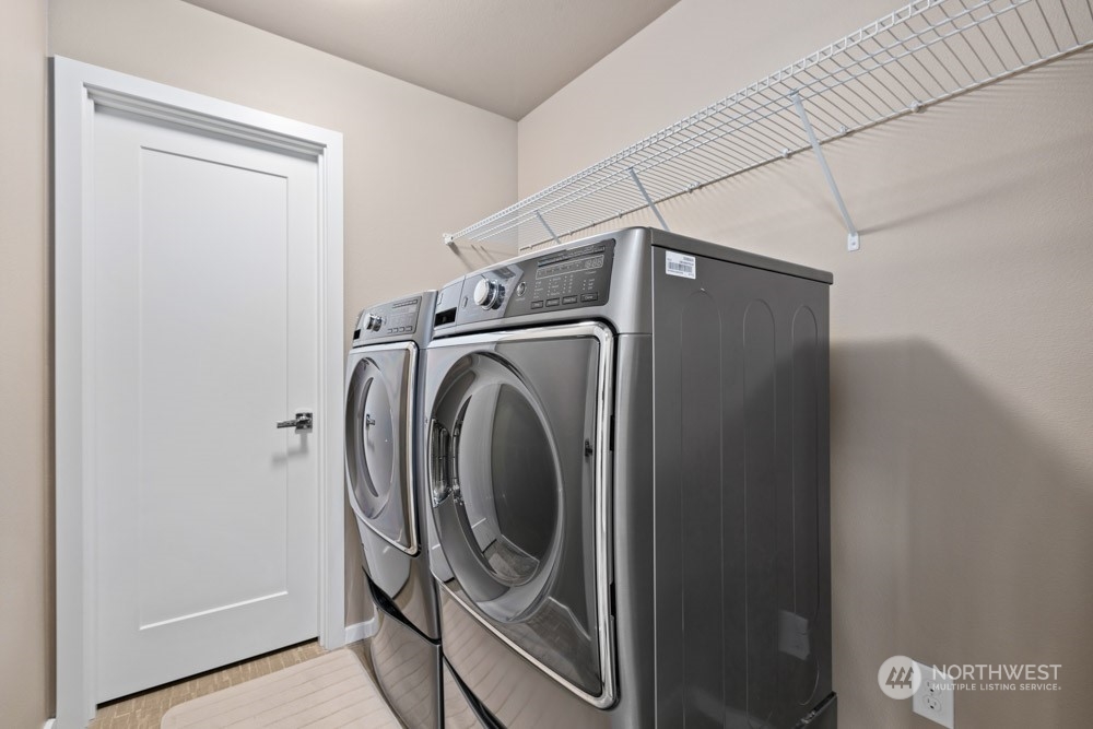 4021 168th Place Southeast Bothell, WA 98012 - Photo 32 of 39 a utility room with dryer and washer