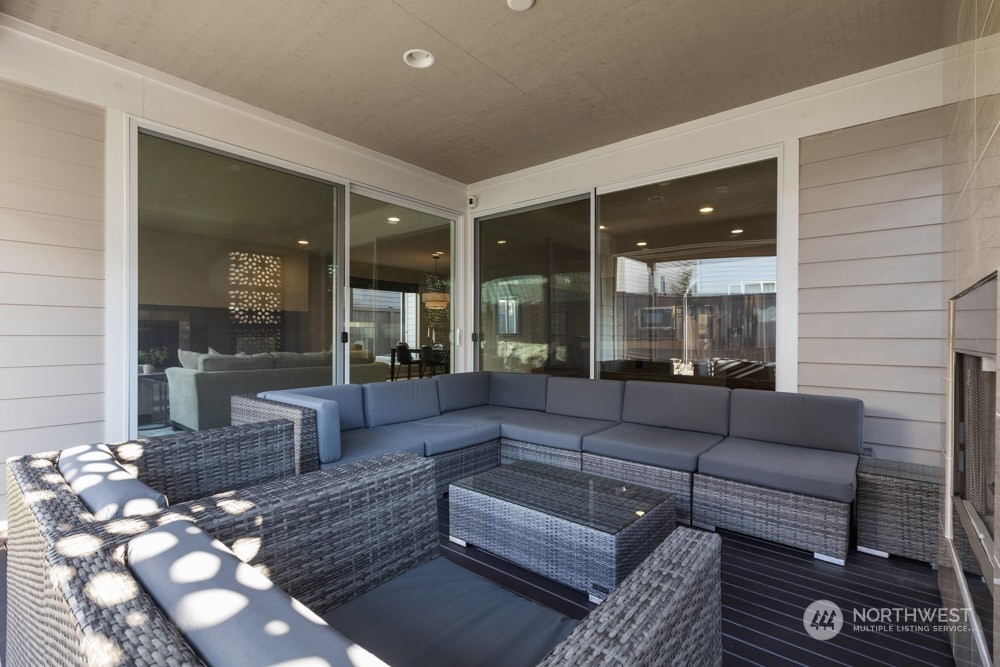 4021 168th Place Southeast Bothell, WA 98012 - Photo 34 of 39 a living room with furniture and a large window