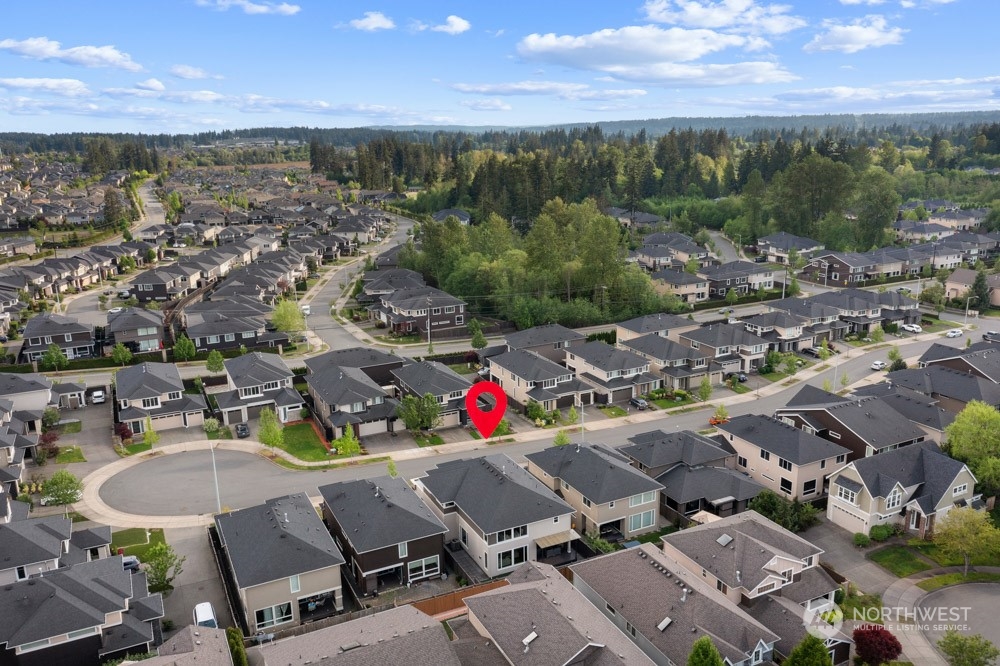 4021 168th Place Southeast Bothell, WA 98012 - Photo 39 of 39 an aerial view of residential houses with outdoor space and ocean view