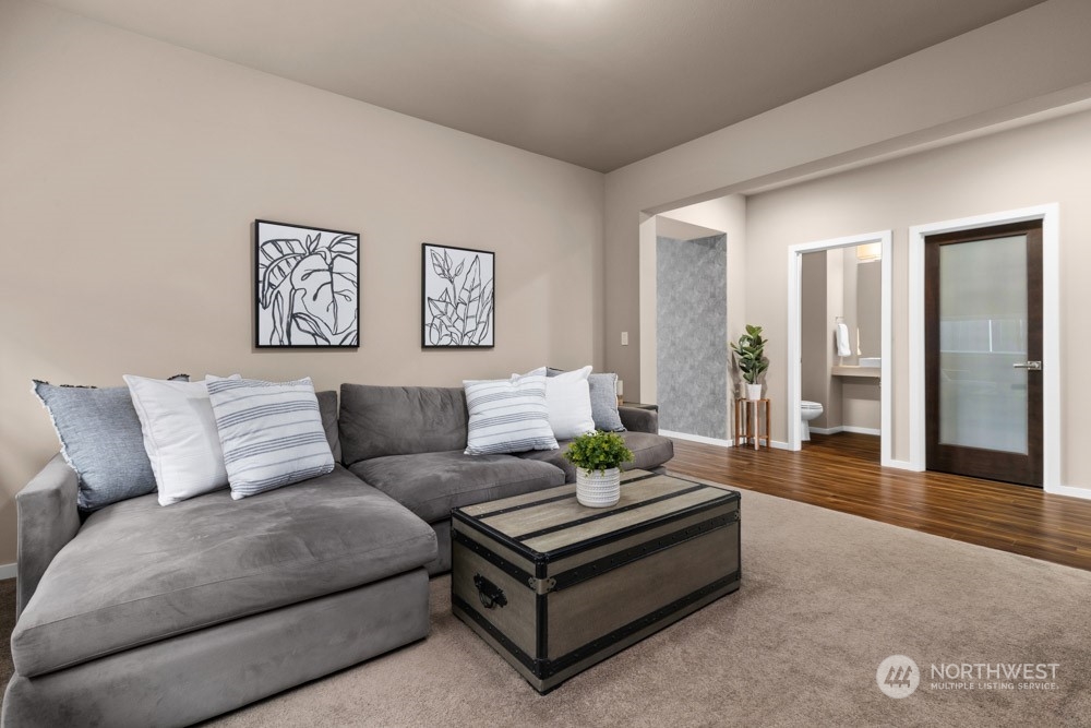4021 168th Place Southeast Bothell, WA 98012 - Photo 6 of 39 a living room with furniture and wooden floor