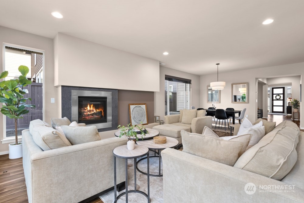 4021 168th Place Southeast Bothell, WA 98012 - Photo 8 of 39 a living room with furniture and a fireplace