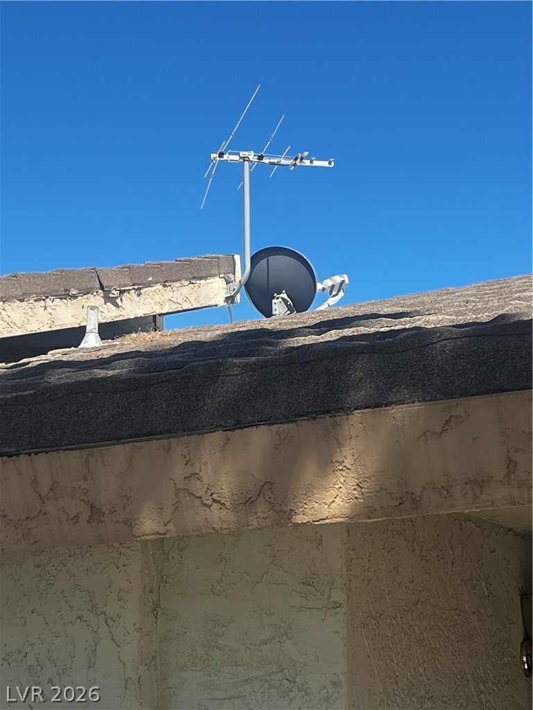 709 Ridgemount Drive Las Vegas, NV 89107 - Photo 10 of 40 Exterior view of a satellite dish, over-the-air, free TV antenna. Note, the HVAC was completely replaced 2.5 years previous.