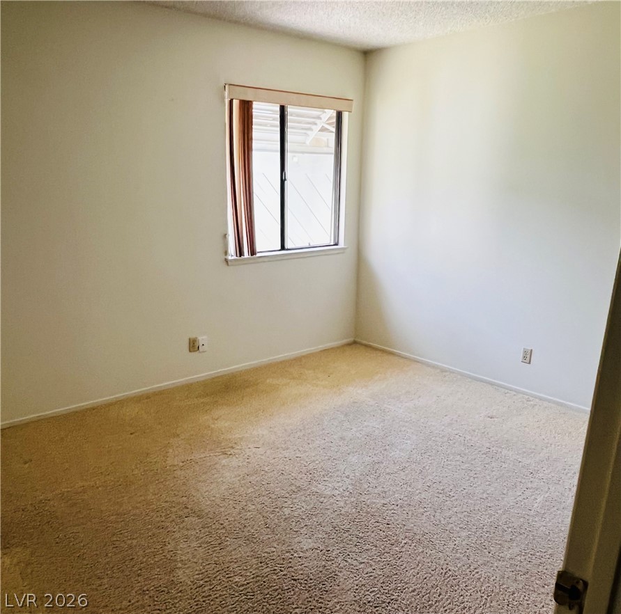 709 Ridgemount Drive Las Vegas, NV 89107 - Photo 23 of 40 Bedroom #2, carpet.
