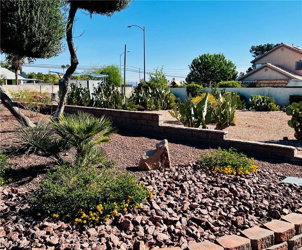 709 Ridgemount Drive Las Vegas, NV 89107 - Photo 34 of 40 HOA has a tastefully designed and maintained cactus garden at entrance.