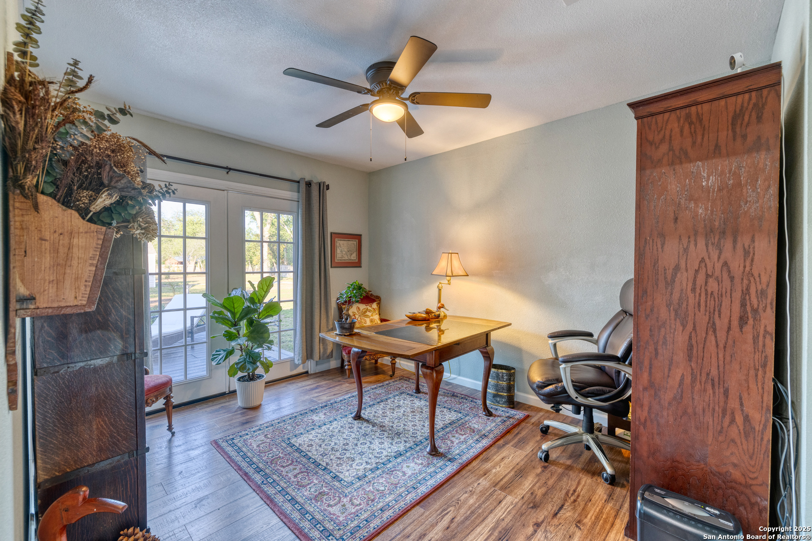 1100 North High Street Uvalde, TX 78801 - Photo 19 of 40 a work room with furniture and a potted plant