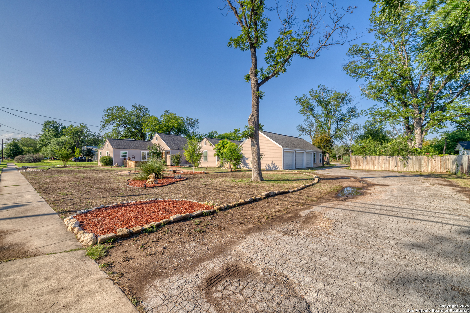 1100 North High Street Uvalde, TX 78801 - Photo 2 of 40 a view of a yard with plants