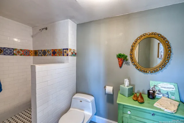 a view of a bedroom from a hallway