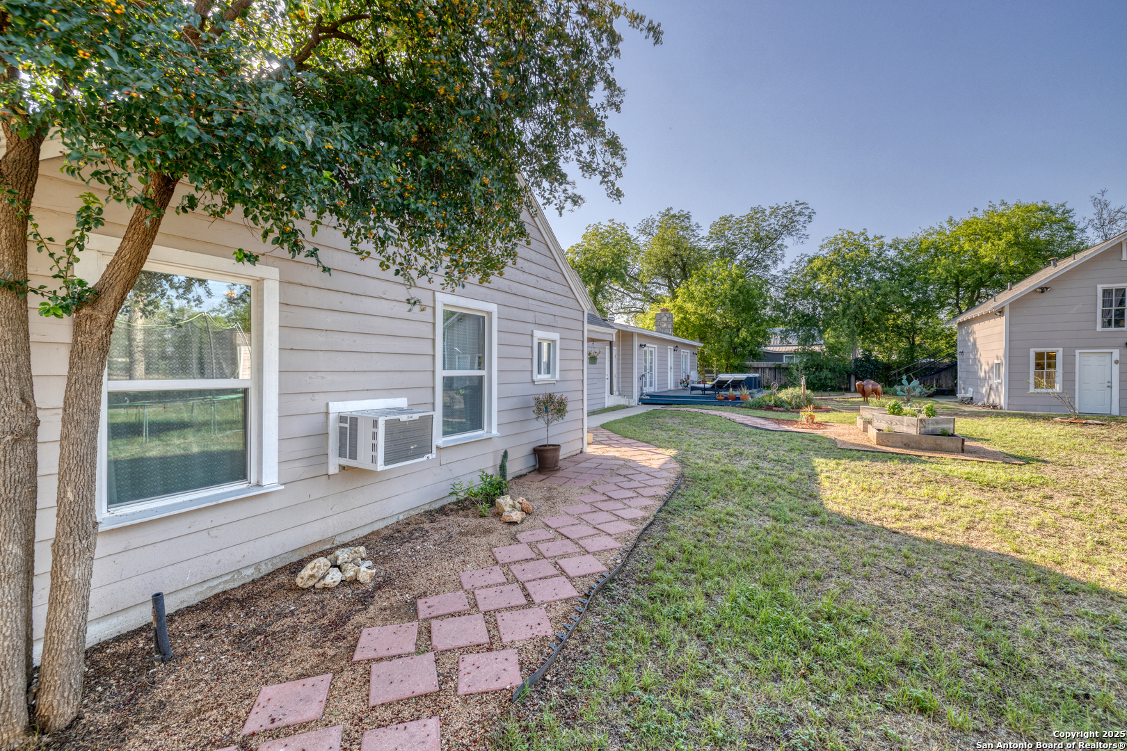 1100 North High Street Uvalde, TX 78801 - Photo 3 of 40 a house view with a sitting space and garden space