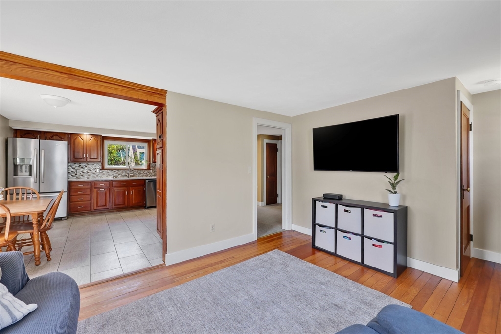 48 Oregon Street Springfield, MA 01118 - Photo 24 of 31 a living room with furniture and a flat screen tv