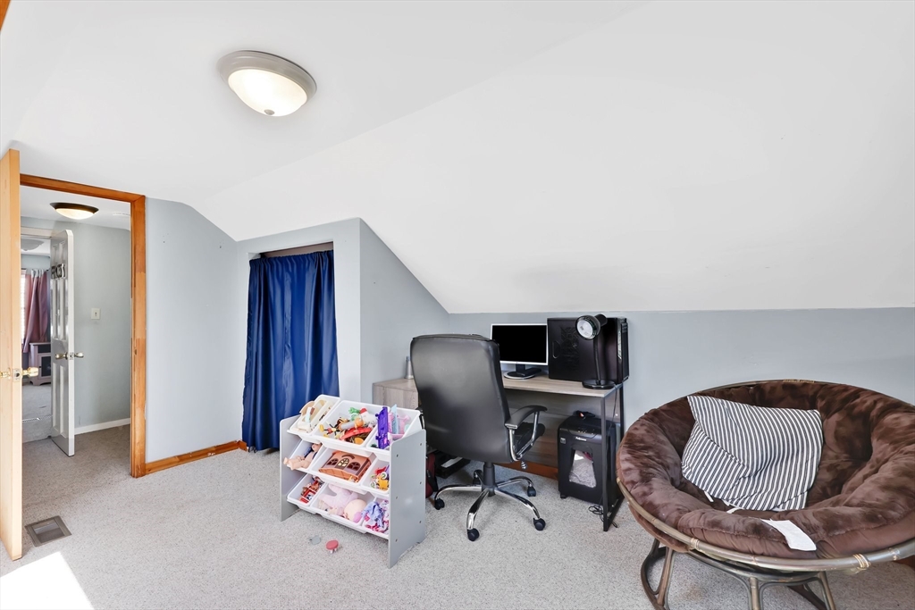 48 Oregon Street Springfield, MA 01118 - Photo 26 of 31 a room with a workspace
