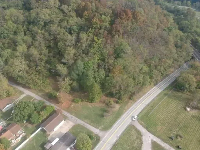 a view of a yard from a balcony