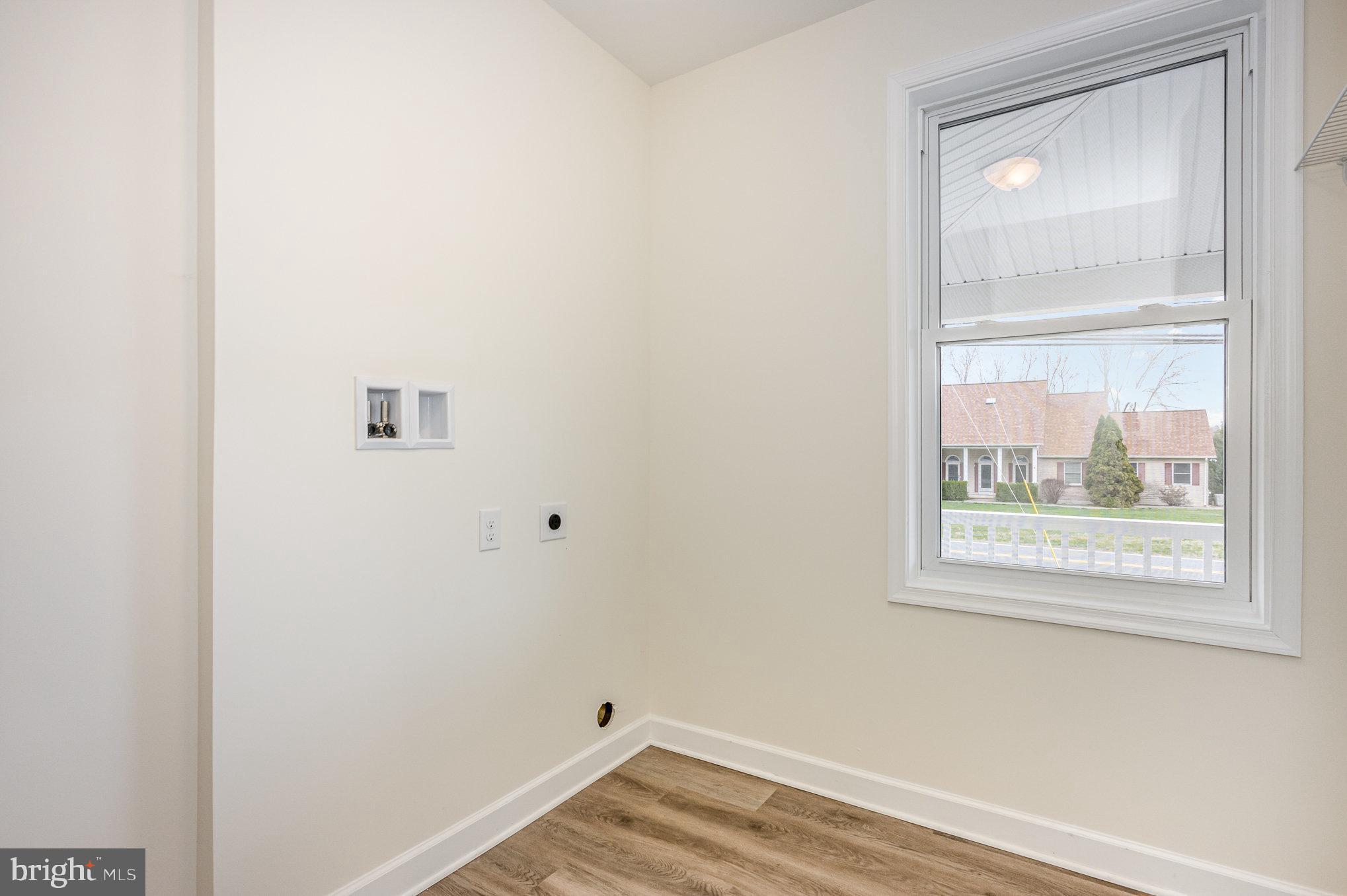 1591 Blue Ball Road Elkton, MD 21921 - Photo 22 of 30 a view of a small space with wooden floor and a window