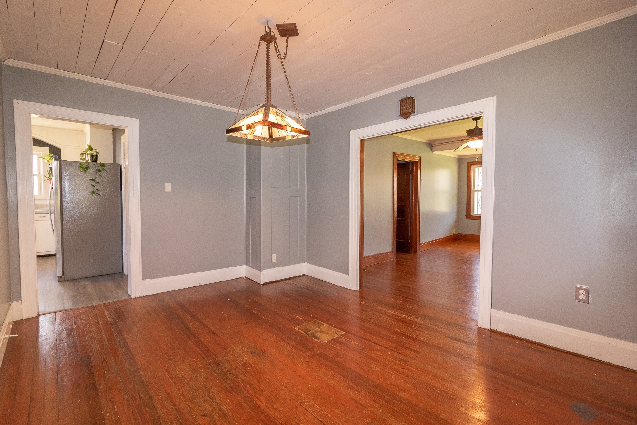 201 South Tunnel Road Portland, TN 37148 - Photo 12 of 41 a view of a hallway with wooden floor and chandelier
