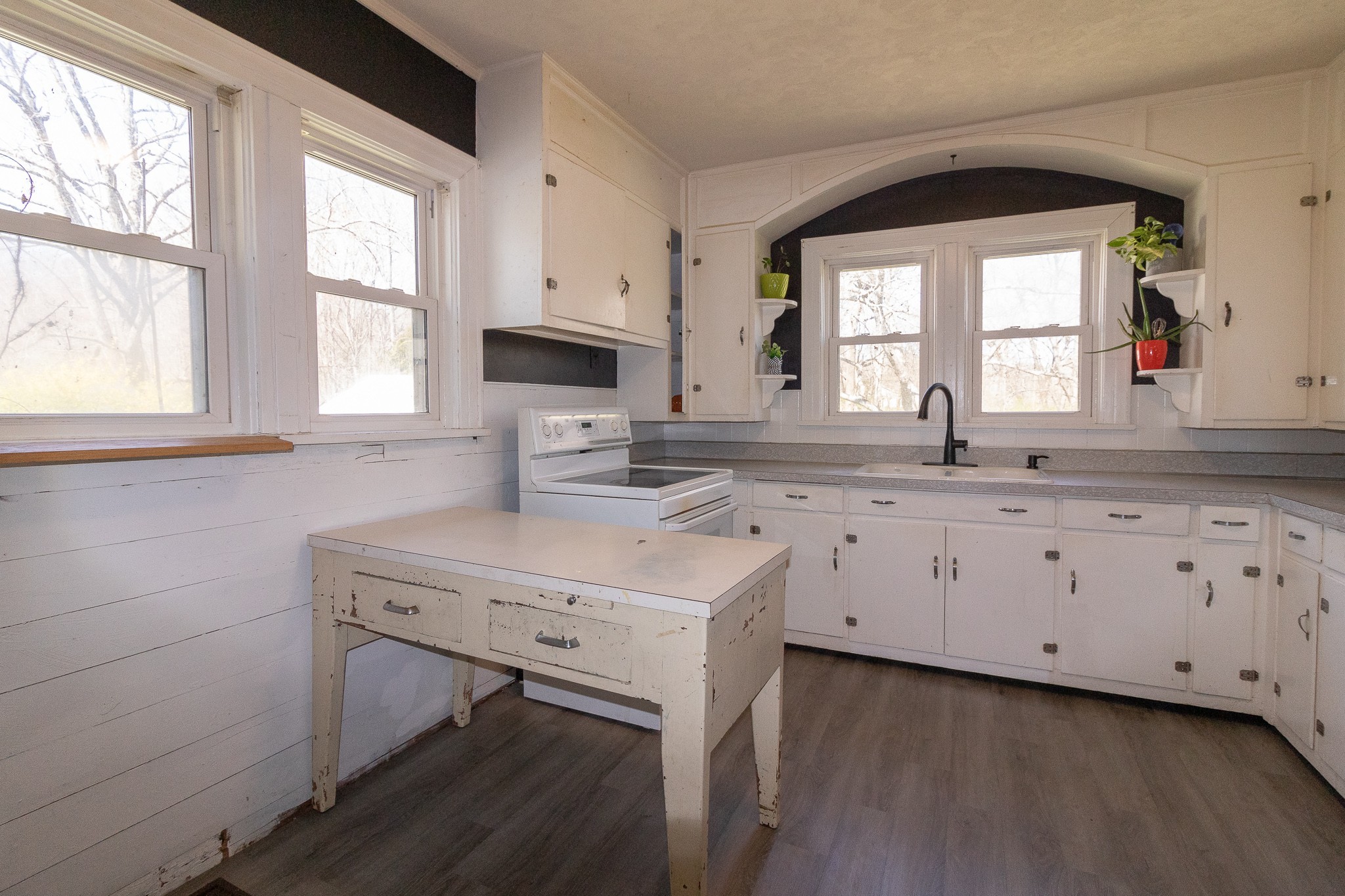 201 South Tunnel Road Portland, TN 37148 - Photo 14 of 41 a kitchen with a sink window and cabinets