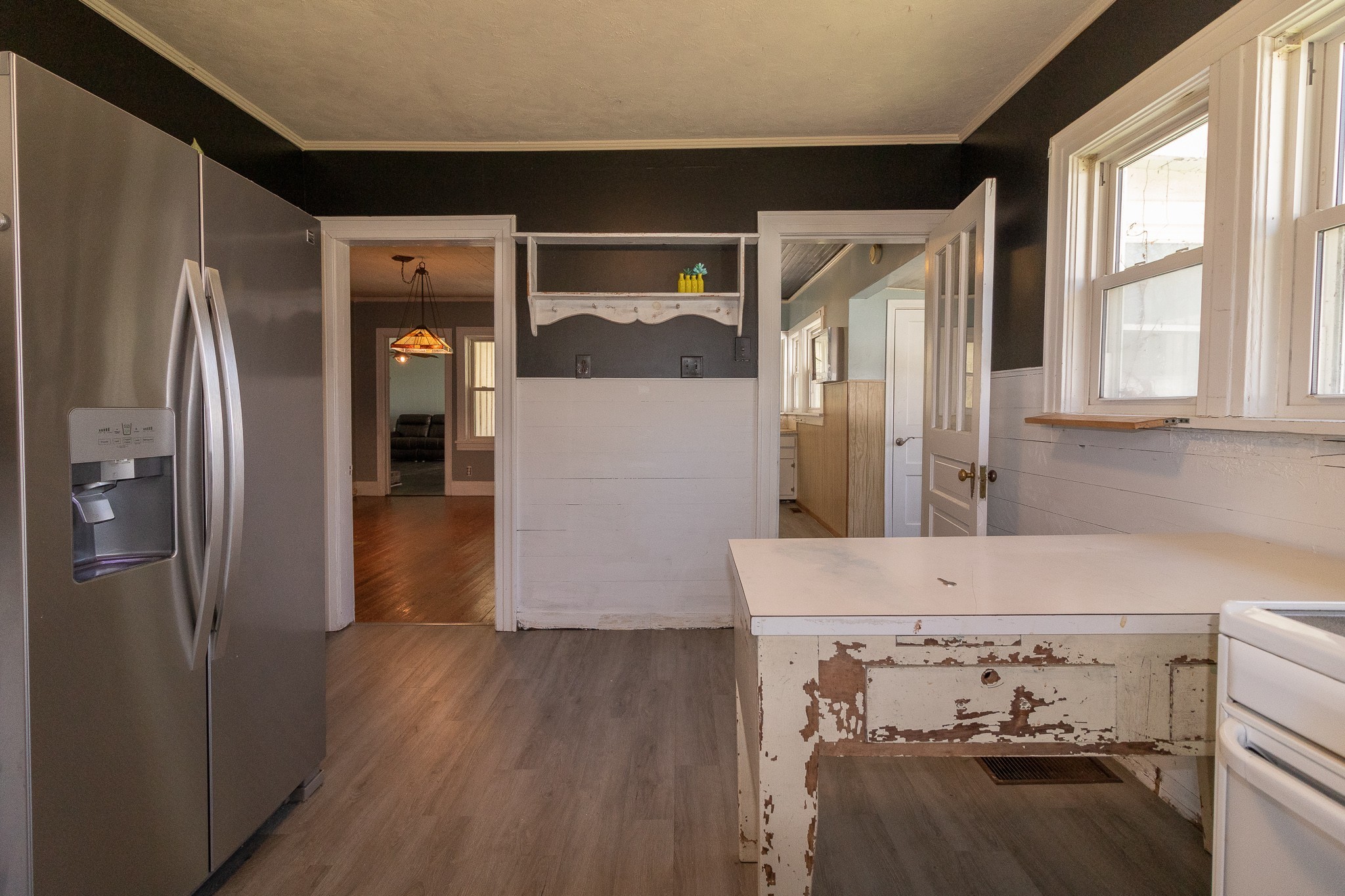 201 South Tunnel Road Portland, TN 37148 - Photo 19 of 41 a kitchen with a refrigerator and a wooden floor