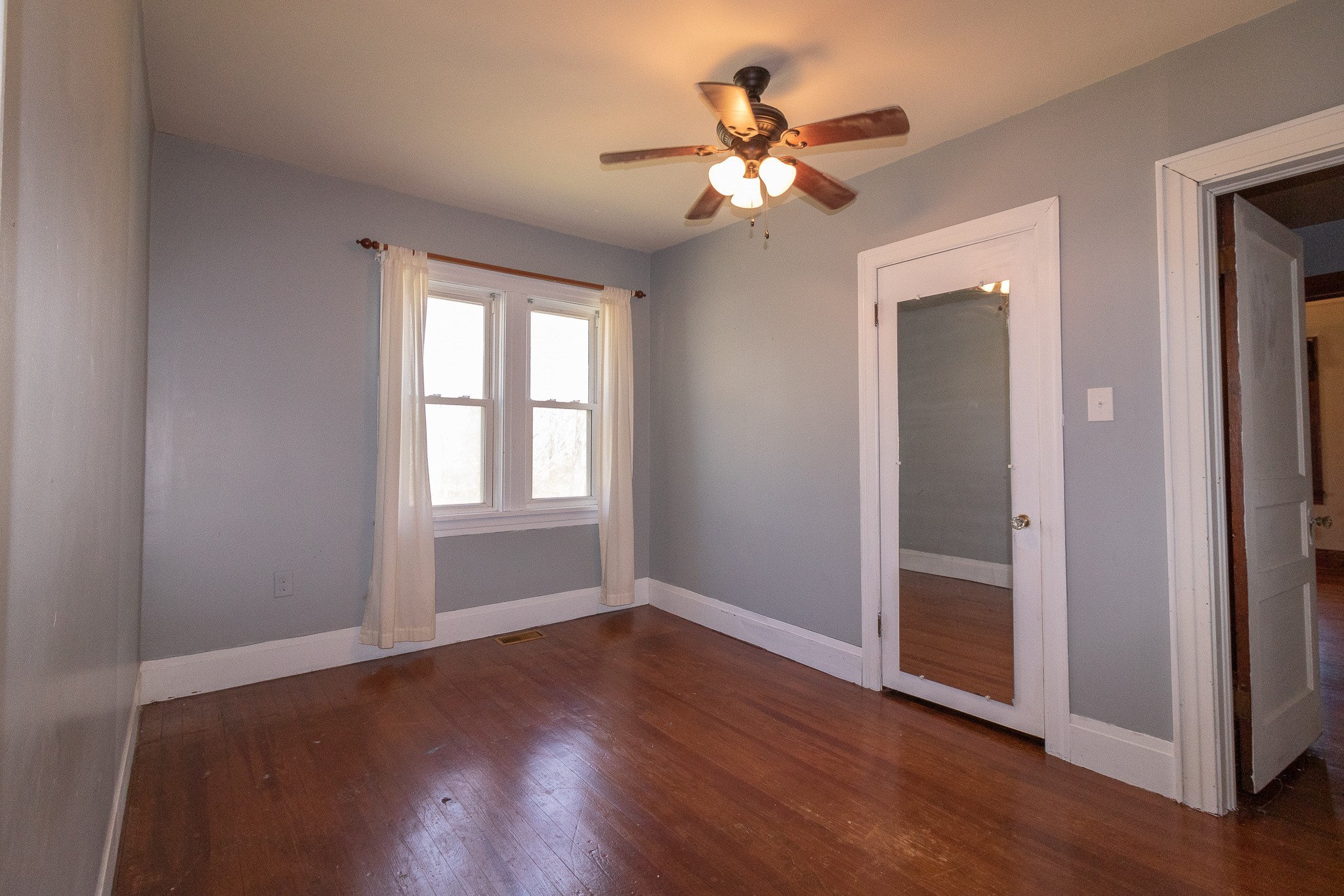 201 South Tunnel Road Portland, TN 37148 - Photo 20 of 41 a view of a livingroom with a fan window and wooden floor