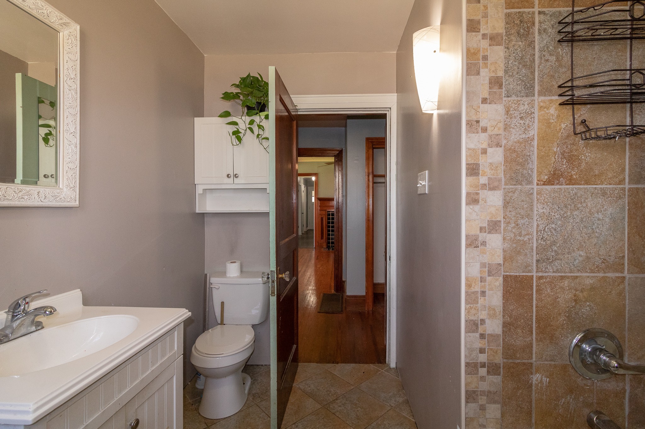 201 South Tunnel Road Portland, TN 37148 - Photo 23 of 41 a bathroom with a sink a toilet and shower