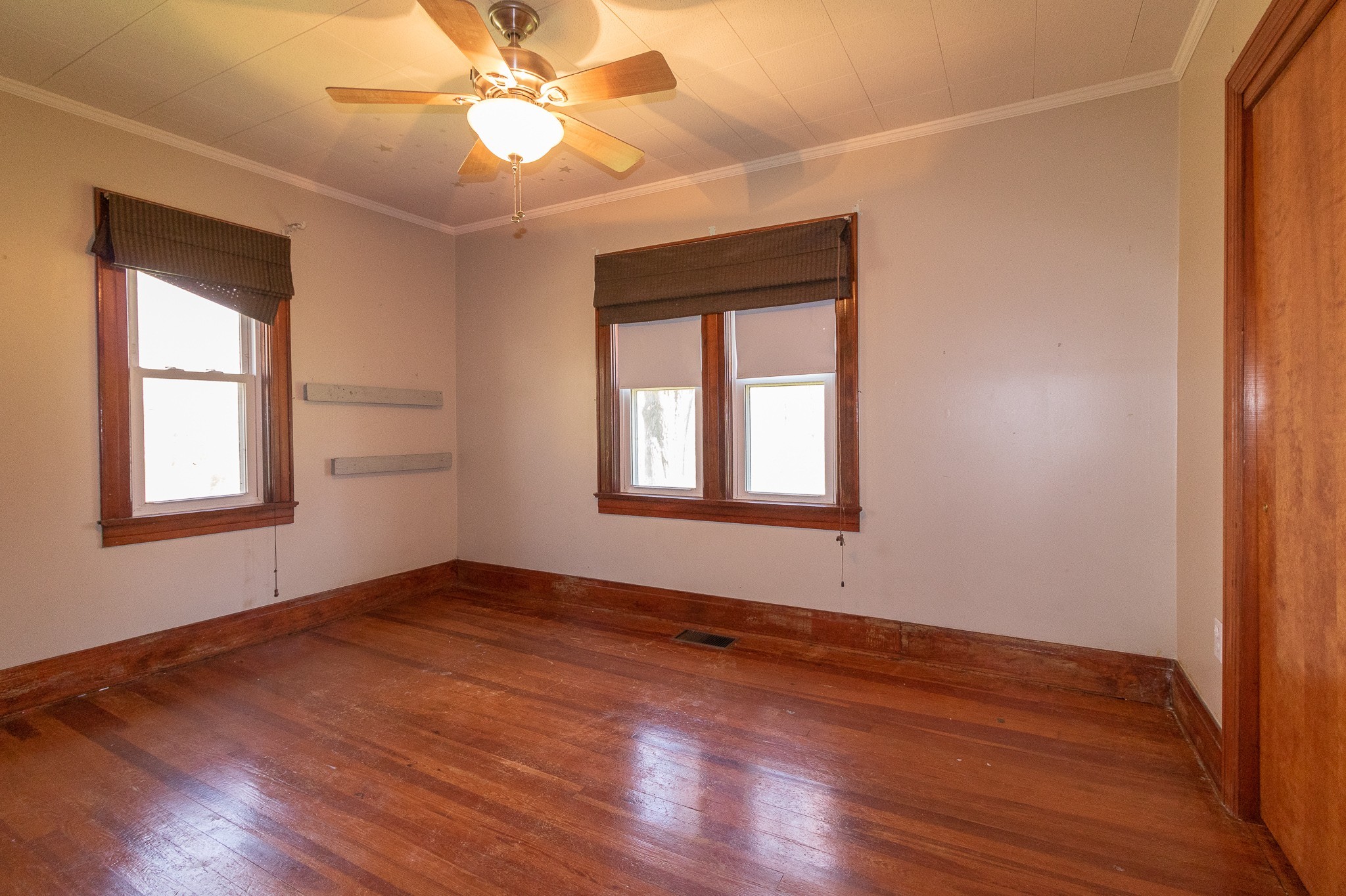 201 South Tunnel Road Portland, TN 37148 - Photo 24 of 41 a view of an empty room with window and wooden floor